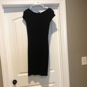 Black boat neck dress. Knee length